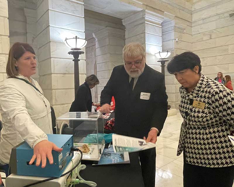 Tiffany Spivey and Kenny Worley demonstrate smoke evacuation