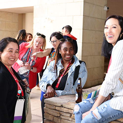 Group of Periop Nurses sit and talk at Expo 2023.